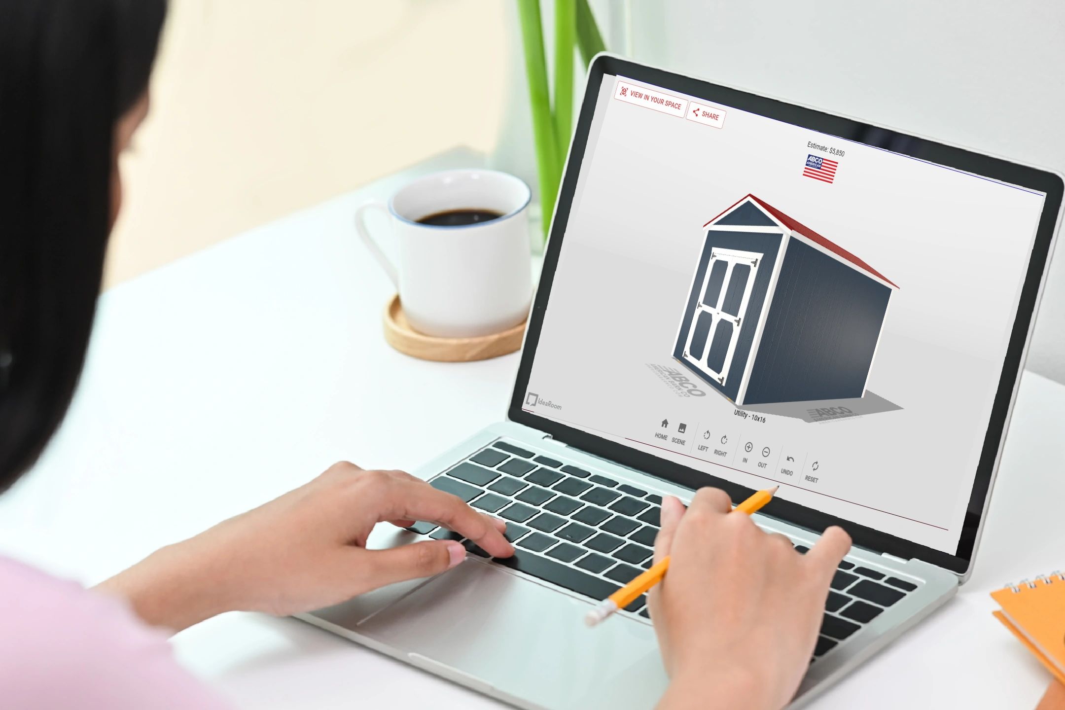 Custom shed online using 3D builder tool on laptop – American Barn Co shed customization platform