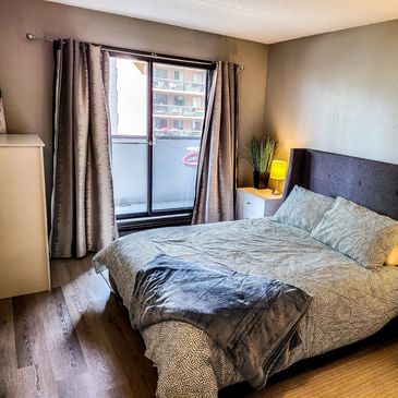 Primary bedroom with queen bed