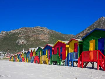 Colorful beach houses on the sand in Muizenberg South Africa
