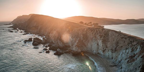 large outcropping of cliffs extending into the ocean