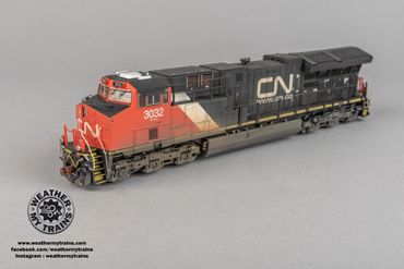 Detailed model of a CN freight train engine numbered 3032.