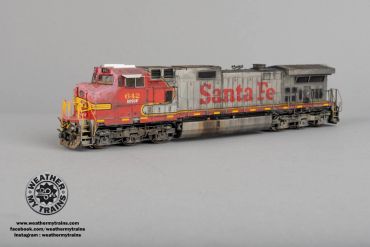 Detailed model of a weathered Santa Fe locomotive train.