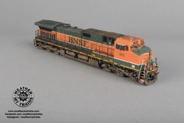 Detailed model of a BNSF locomotive on a plain background.