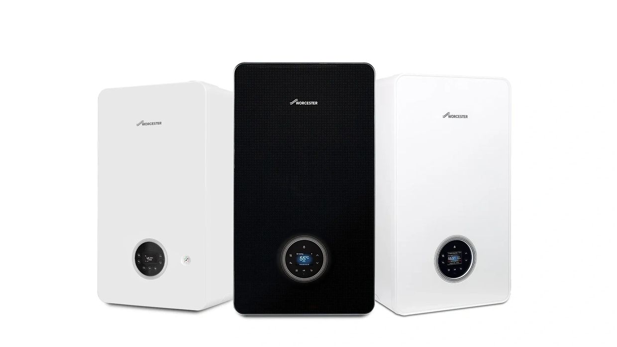 Three Worcester boilers with digital displays, two white and one black.