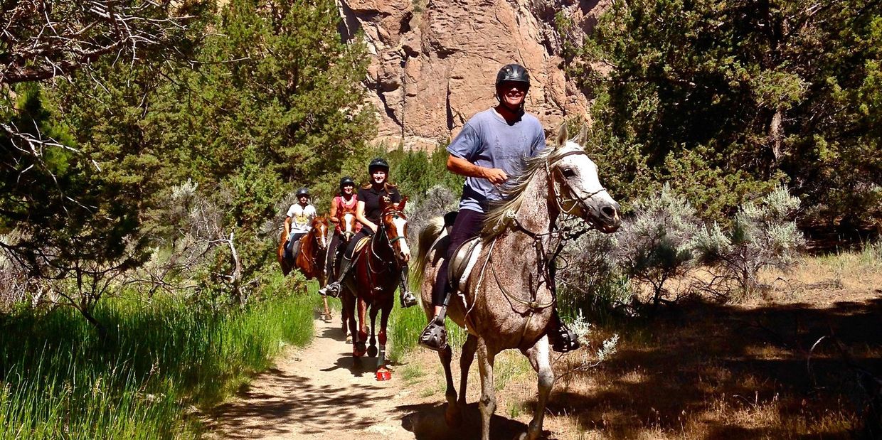 Group of riders on the Smith Rock Trail.