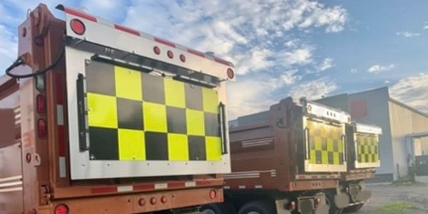 Photo: Three plow trucks with four season supply and mechanical custom MTO spec sign boards installe