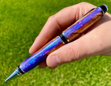 Hand turned pen from Huon Pine and resin