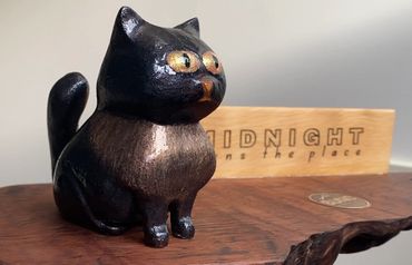 Custom designed, hand carved and painted cat
