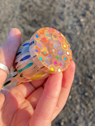 Bud vase from pencils in resin