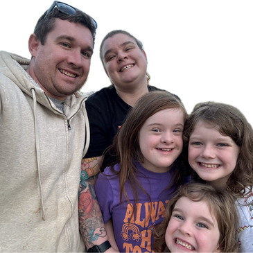 Happy family selfie with parents and three smiling children.