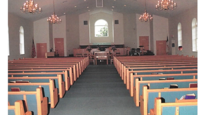 An empty church aisle