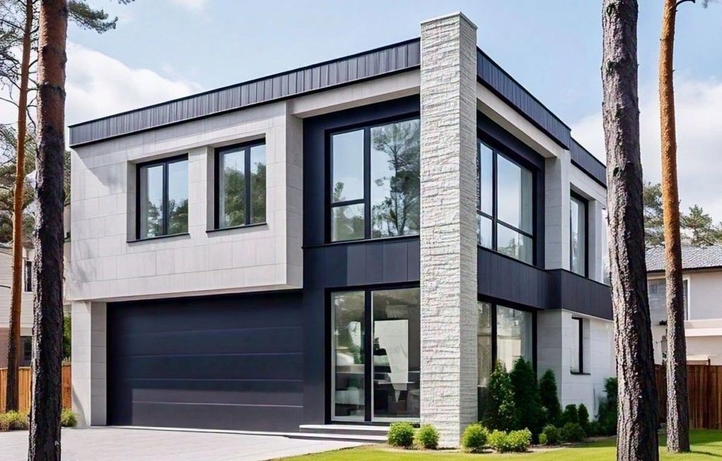 Modern two-story house with black and white exterior.