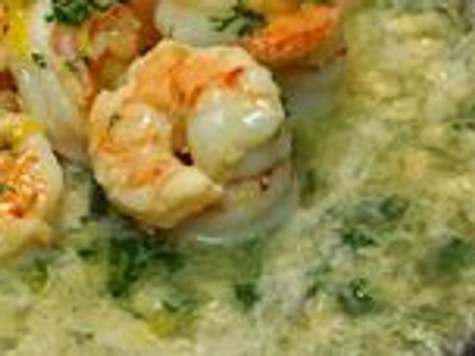Shrimp Scampi cooked with anchovi italian parsley in a delicious butter sauce.