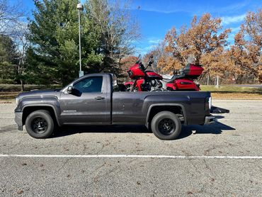 Motorcycle towing transport