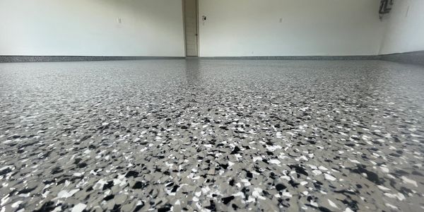 Grey flaked epoxy floor
Houston texas epoxy floor installers