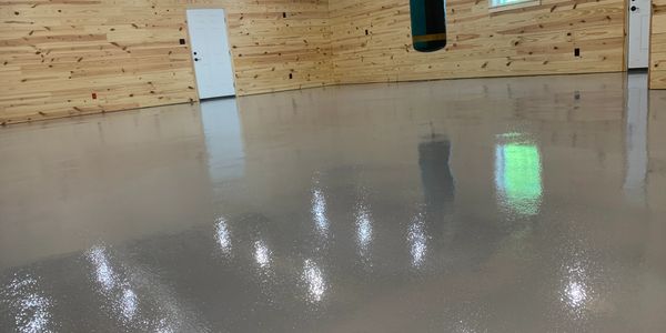 Grey Solid Color Epoxy Floor In A Residential Garage Floor.