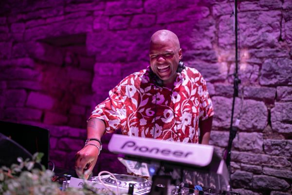 DJ from UK smiling while performing in Croatia
