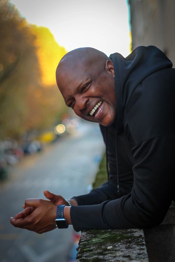 Casual Picture of a DJ genuinly smiling