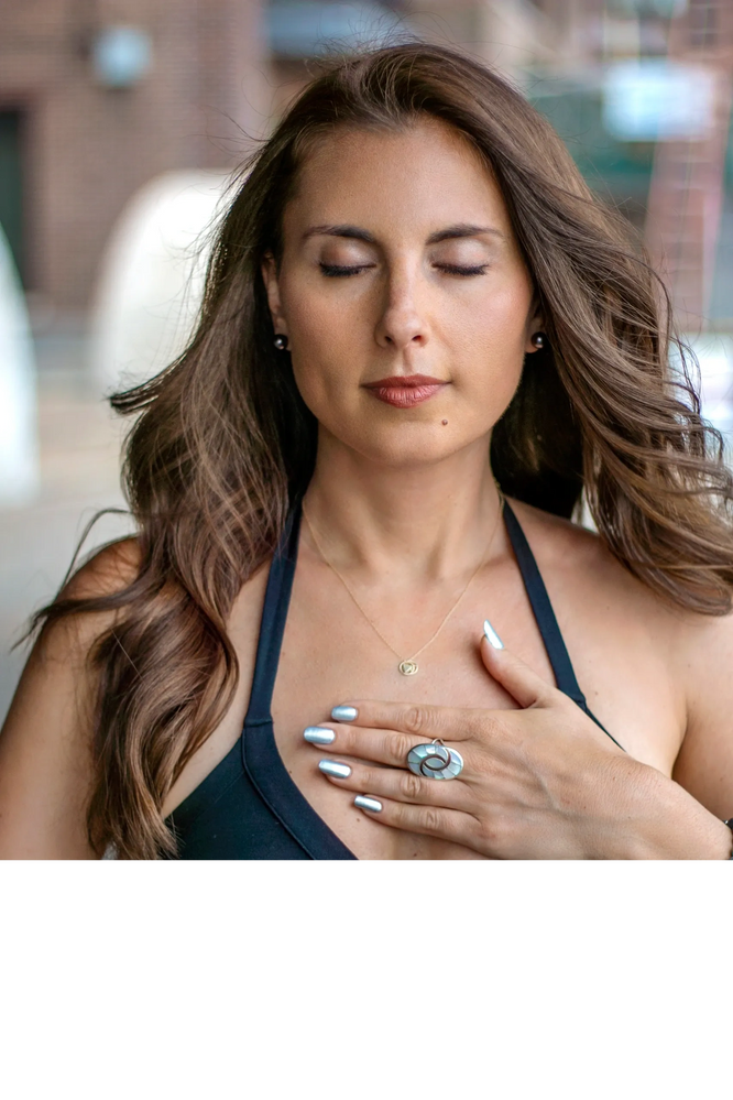 Founder Lindsey Pearson meditating in NYC