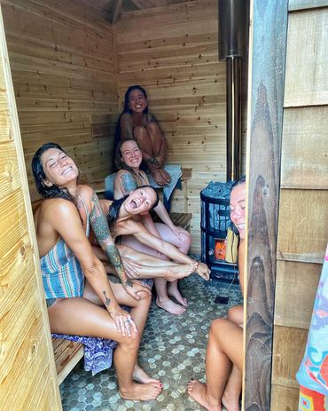 five woman in a room for The Cedar Sauna CURE