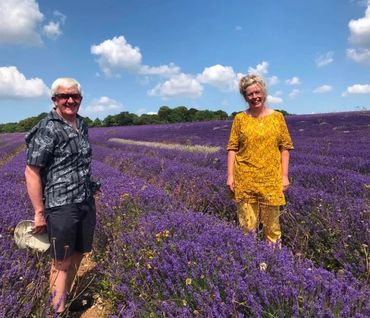 Esther and Stephen Fleming (from Bee Craft Magazine) standing in a lavender field.