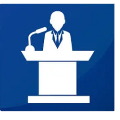 Icon of a person speaking at a podium with a microphone.