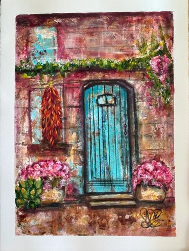 Rustic blue door surrounded by vibrant flowers and greenery on a textured wall.