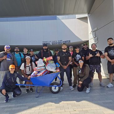 Group of volunteers with supplies outside County of Santa Clara Animal Services Center.