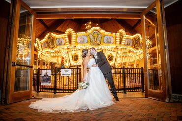Bride and Groom at the Carousel at East Wind Caterers Wading River New York