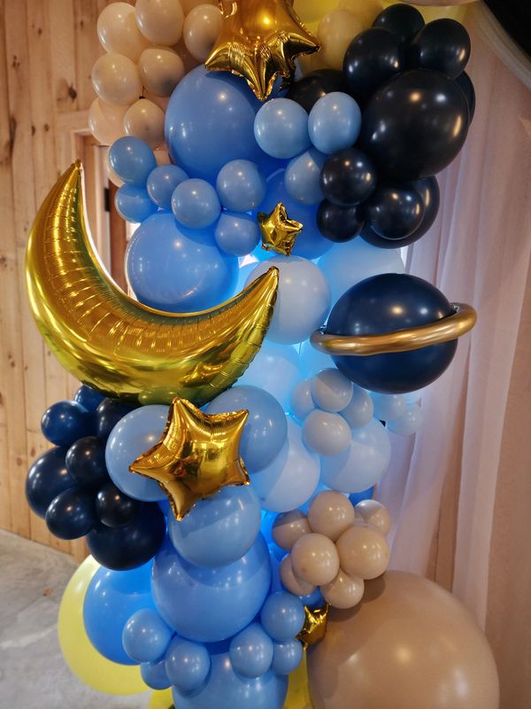To the moon and back baby shower balloon decorations with moon, planets and stars