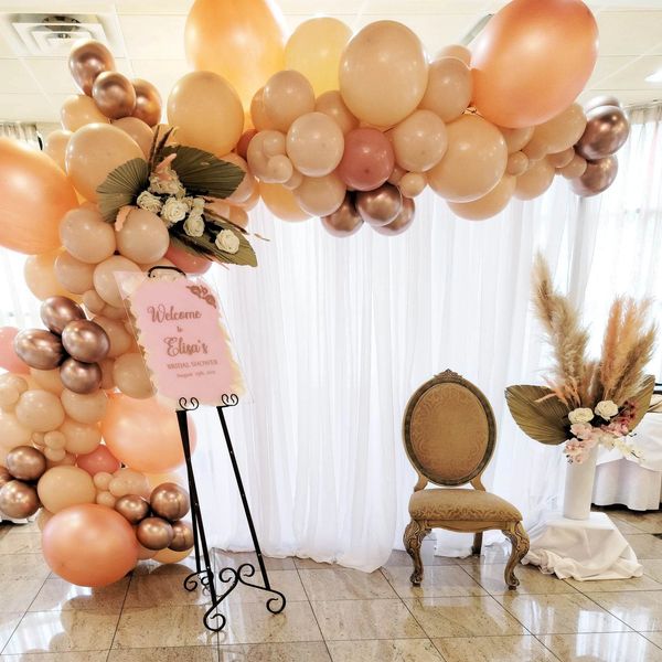 Bridal Shower Balloon Garland with  sheer Draped Backdrop and pampas grass with fan palms