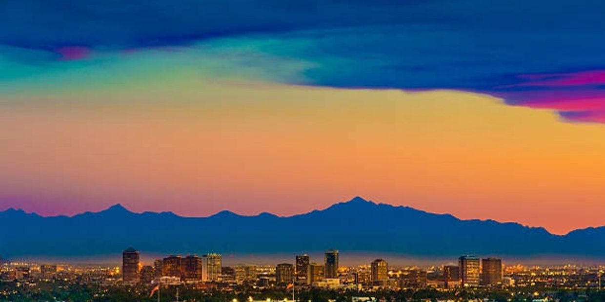 Skyline view of downtown Phoenix with the mountain backdrop.