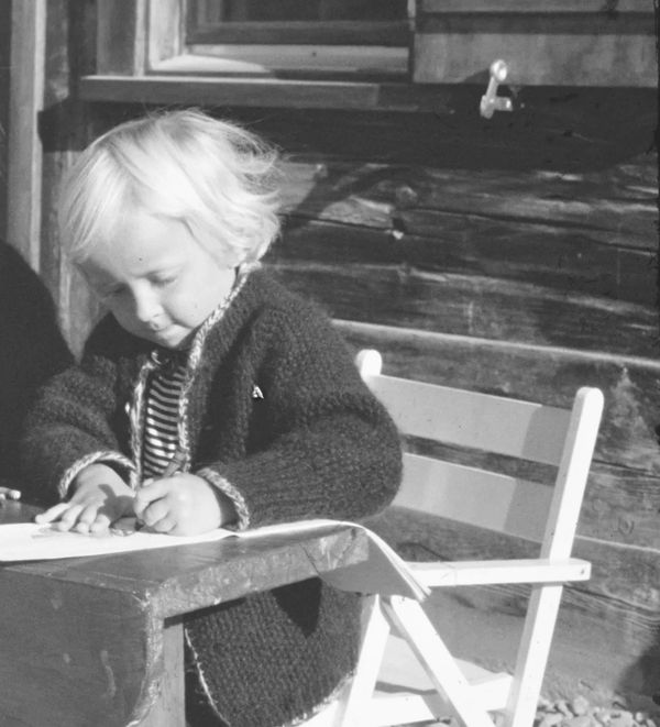 Me as a little girl drawing in our mountains in Switzerland and always feeling happy in my creation