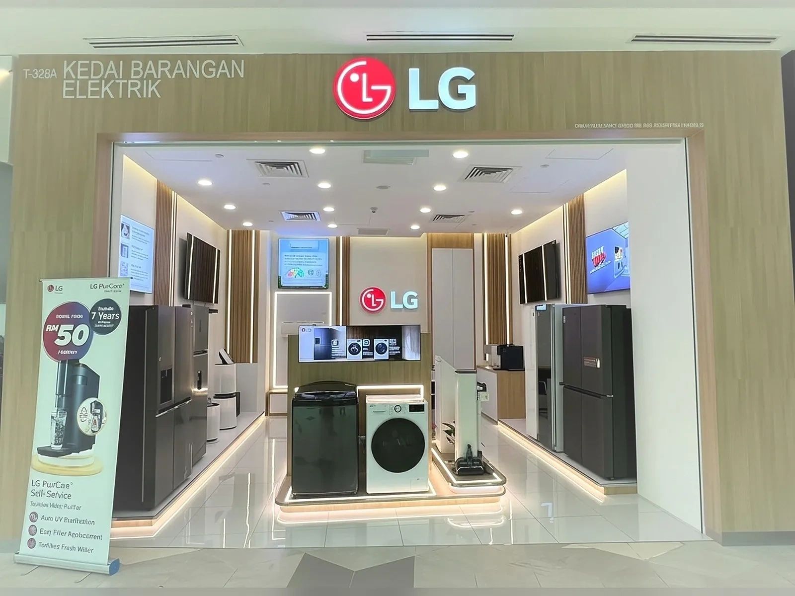 Modern LG electronics store showcasing appliances like refrigerators and washers.