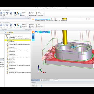 3D CAD software showing toolpath generation for machining a complex part.