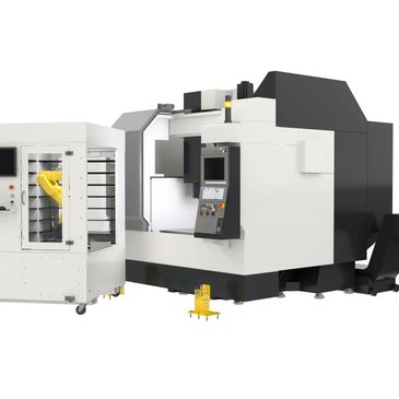 Modern industrial CNC machine with robotic arm for automated manufacturing.