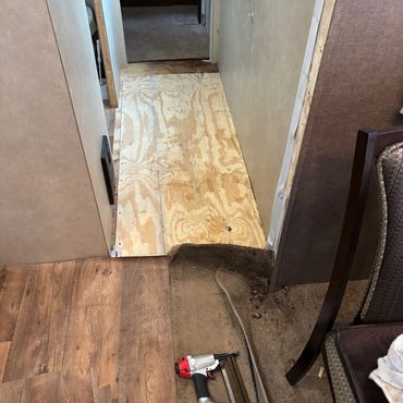 Water damaged camper floor repair on site!