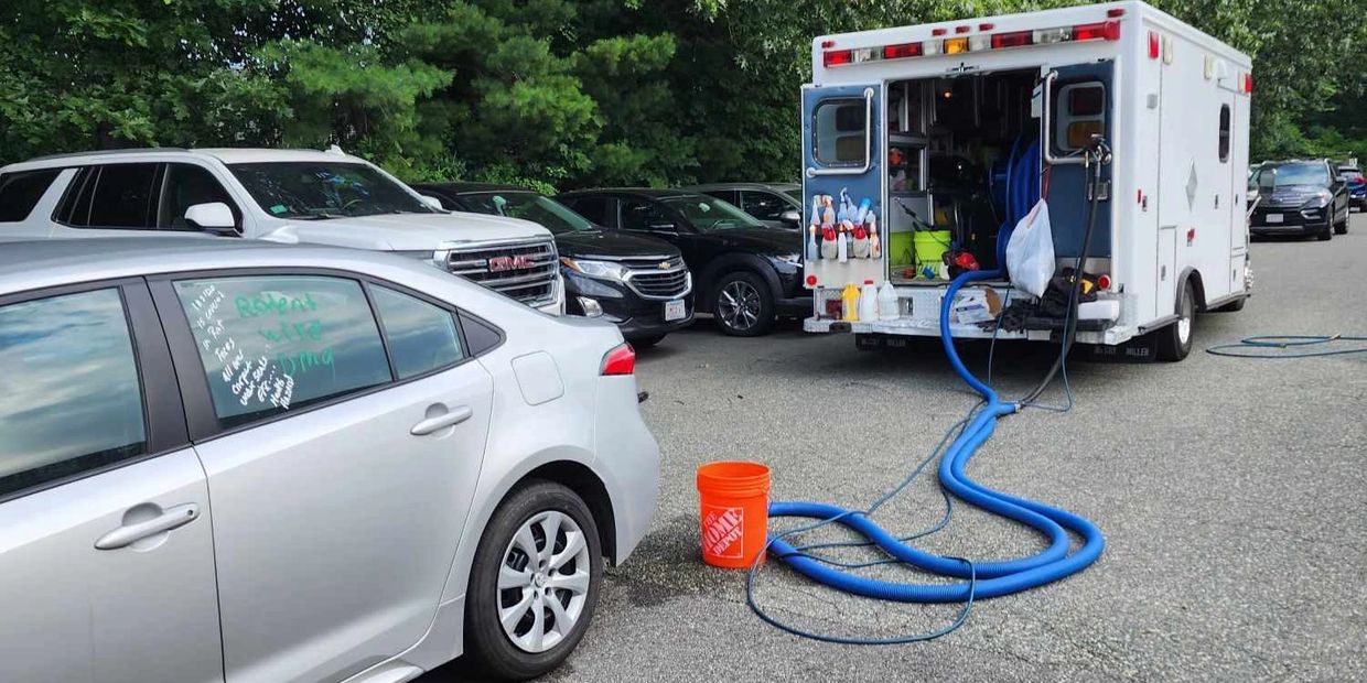 Biohazard PRO's service vehicle conducting mobile auto detailing services in Massachusetts.