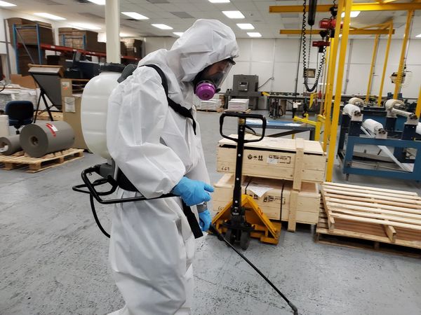 biohazard cleanup and infection control in an industrial building for covid-19 coronavirus