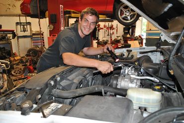 Alex replacing an alternator.