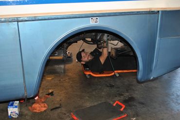 Greg is repairing the front end of a motorhome.