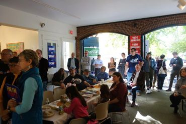 Merrimack County Democrats
Fall Harvest Fest in Concord, NH
crowd and Veto Sununu signs