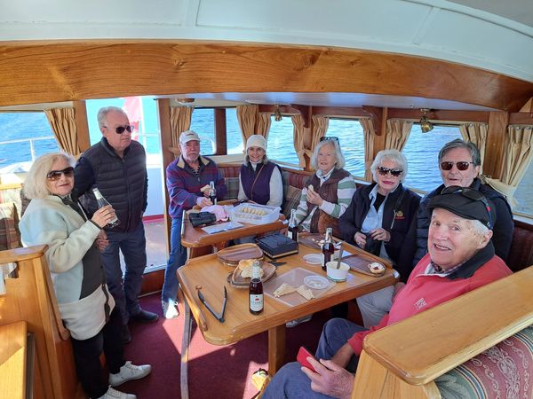 Standard Charter - Huon River Cruises - A group on a private charter in the comfortable cabin