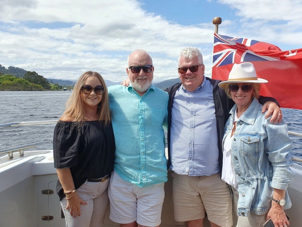 Small Group Cruise - Huon River Cruises - Group on the aft deck, all smiling