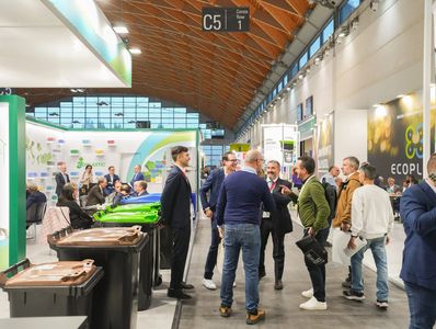 Visitors networking with exhibitors at Ecomondo