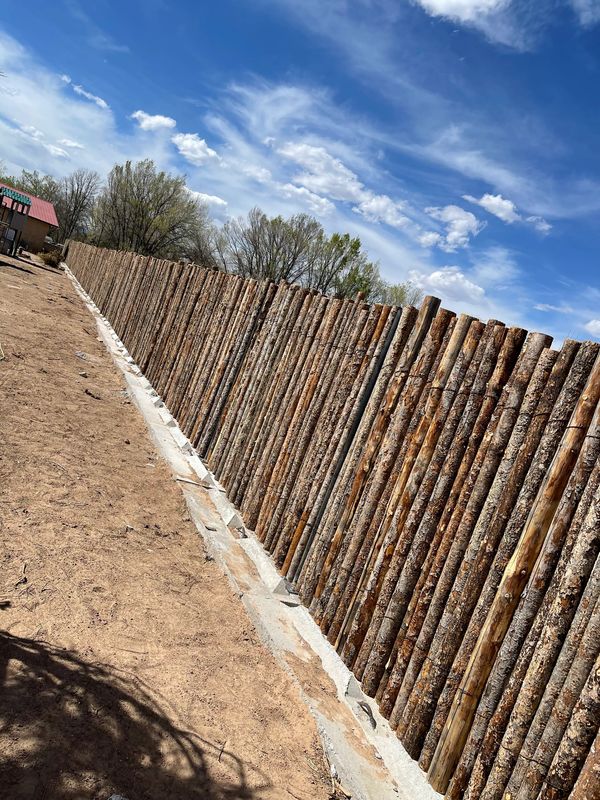 Durable coyote fence installation in Albuquerque by XeriPro.