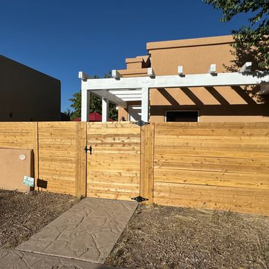 High-quality cedar fence installed by XeriPro in Santa Fe, providing a low-maintenance