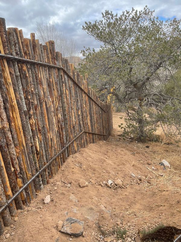 Durable coyote fence installation in Albuquerque by XeriPro.