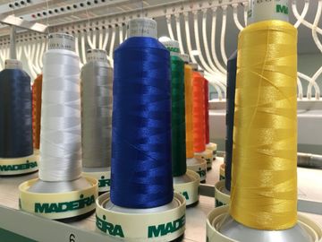 Embroidery cones on our in house embroidery machine