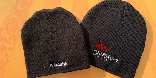 Embroidered winter knit caps for companies to advertise their logo